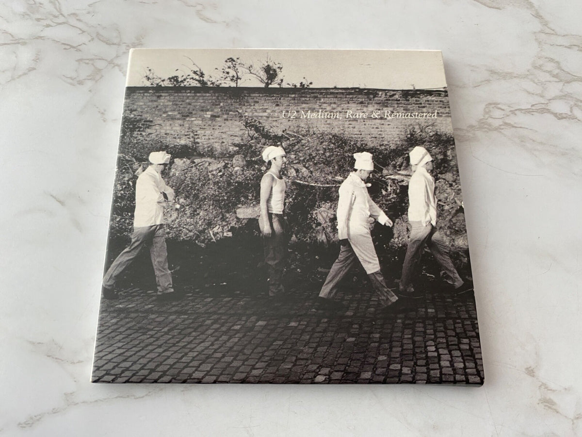 U2 – Medium & Remastered (2009) [UK PRESS]