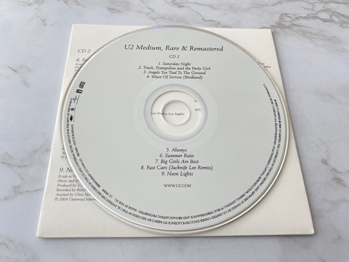 U2 – Medium & Remastered (2009) [UK PRESS]