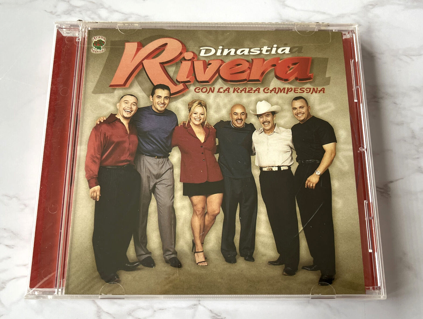Dinastia Rivera, Jenni Rivera, Lupillo Rivera, Various – Con La Raza Campesina (2003) [ORIGINAL USA PRESS]