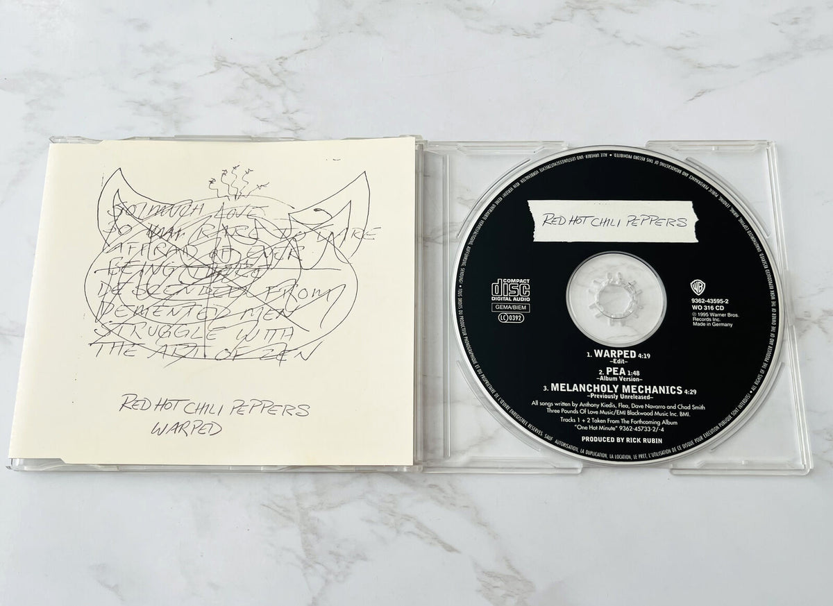 Red Hot Chili Peppers – Warped (Numbered) (1995) [GERMAN PRESS]