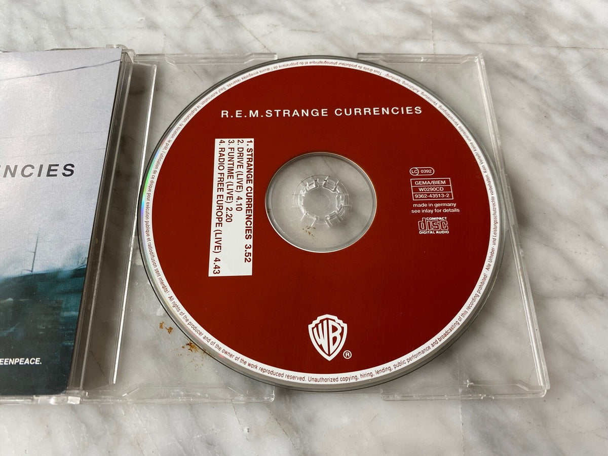 R.E.M. – Strange Currencies (1995) [GERMAN PRESS]