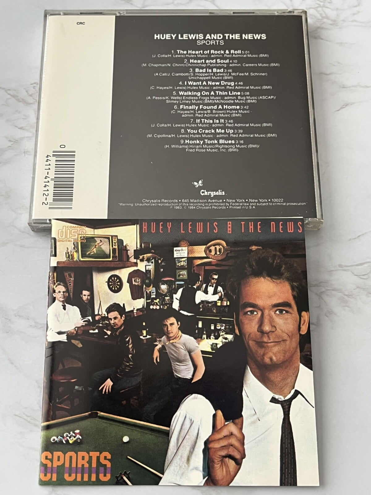 Huey Lewis And The News – Sports (1984) [DADC PRESS]