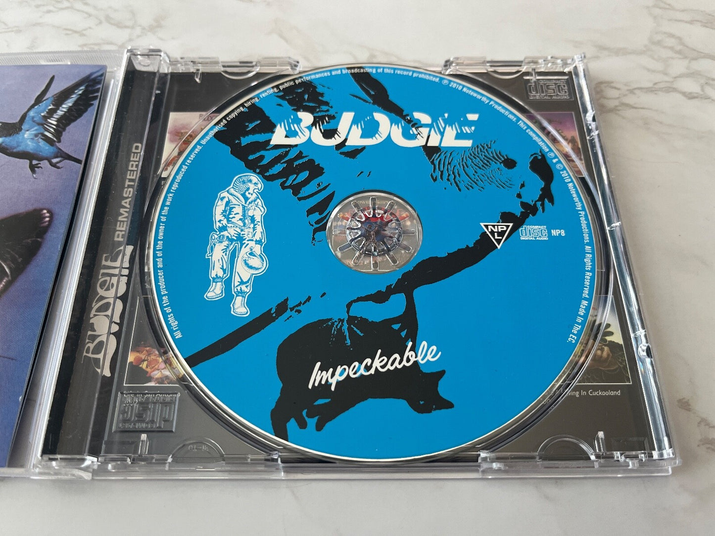 Budgie – Impeckable (2010) [UK PRESS]