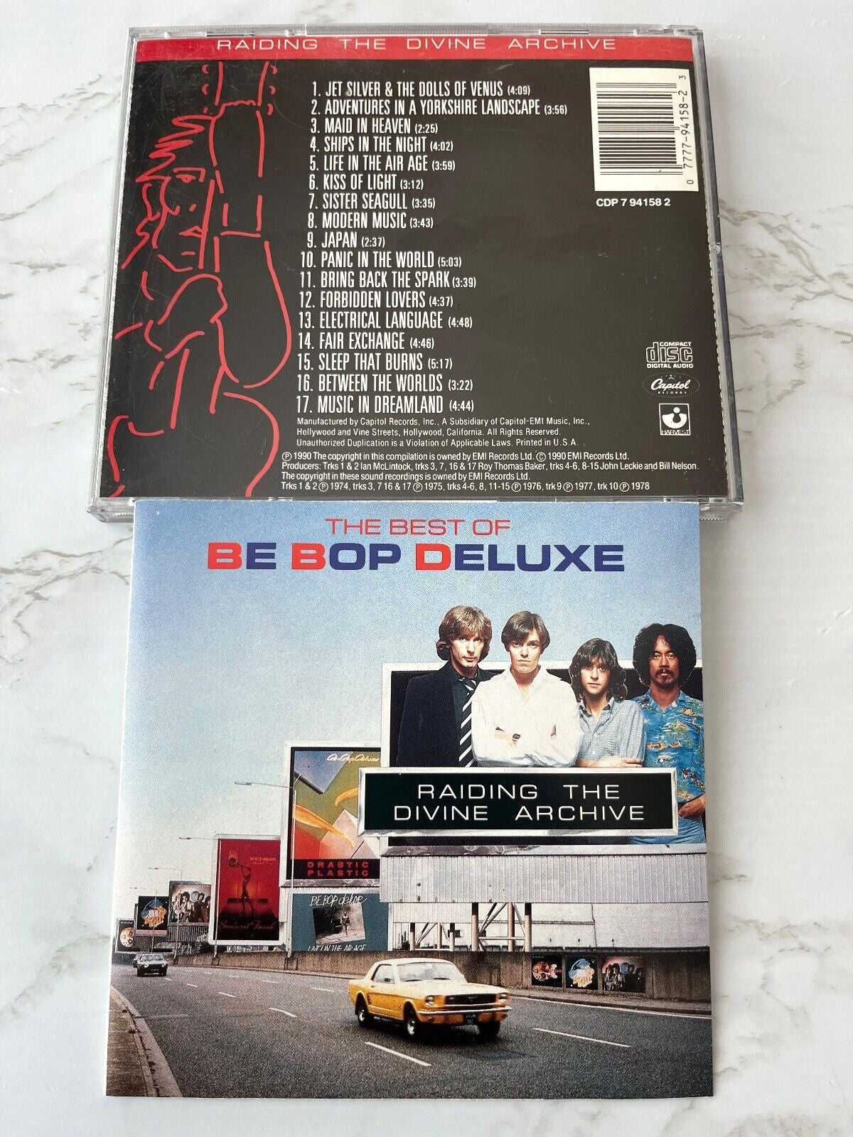 Be Bop Deluxe – Raiding The Divine Archive (1990) [ORIGINAL USA PRESS]