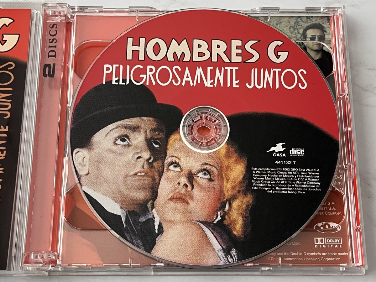 Hombres G – Peligrosamente Juntos (CD/DVD) (2002) [ORIGINAL MEXICO PRESS]