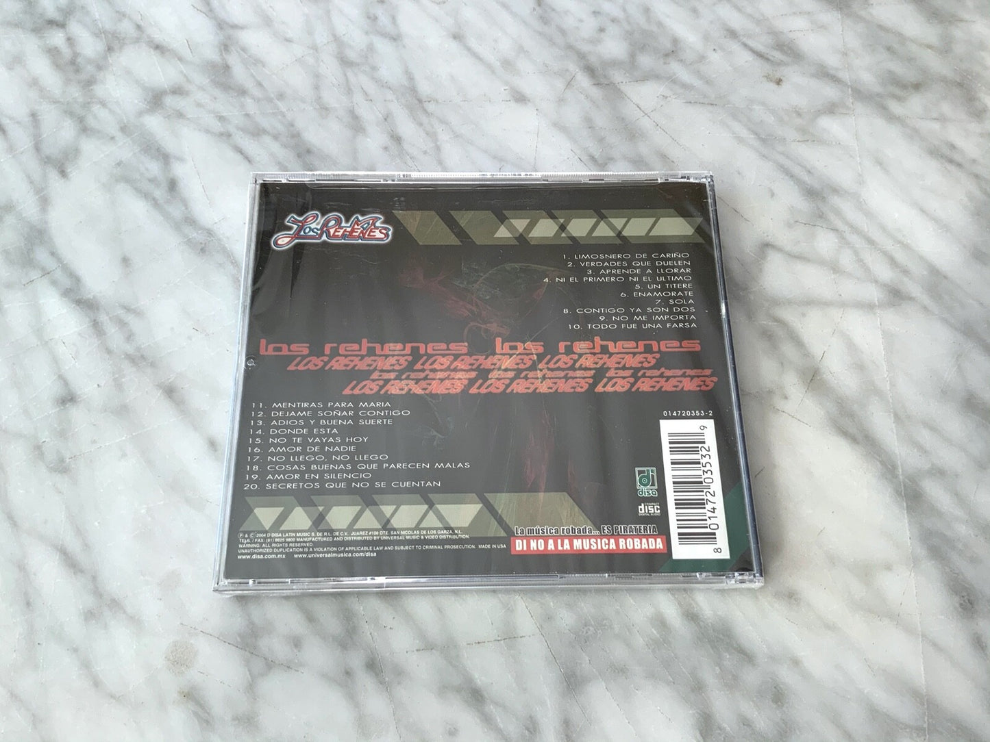 Los Rehenes – 20 Memorias (2004) [ORIGINAL USA PRESS]