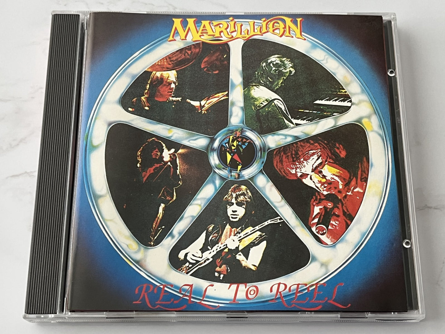 Marillion – Real to Reel (1987) [W GERMANY TARGET ERA]