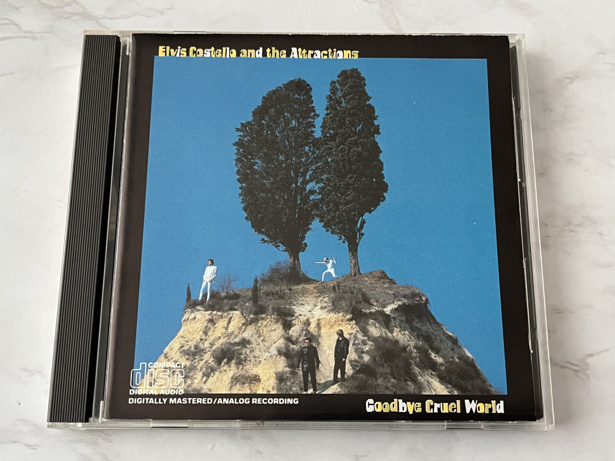 Costello, Elvis & the Attractions, Elvis Costello And The Attractions – Goodbye Cruel World [DADC PRESS]
