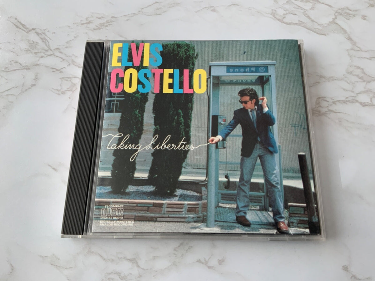 Elvis Costello – Taking Liberties [DADC PRESS]