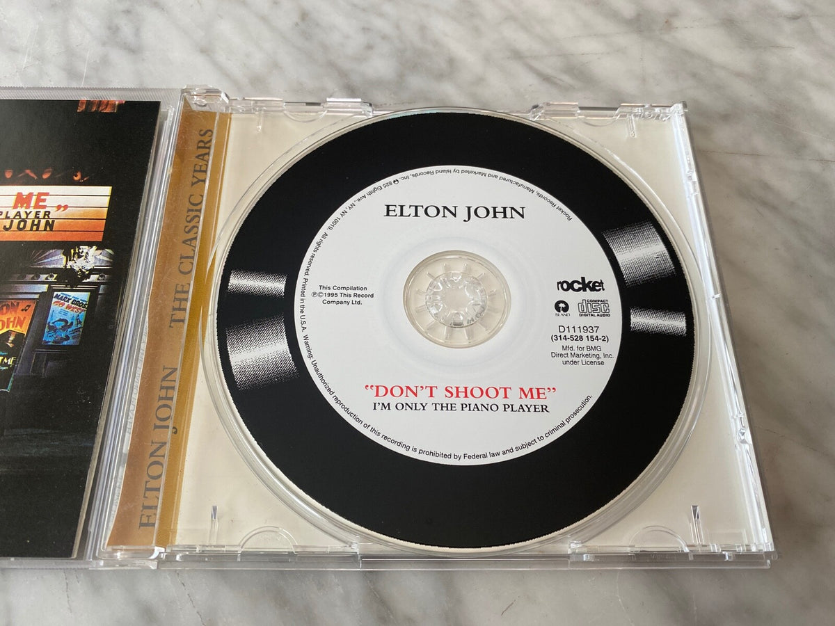 Elton John – Don't Shoot Me I'm Only The Piano Player (1995)