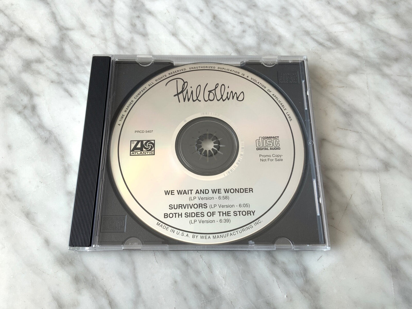Phil Collins – We Wait And We Wonder (Promo) (1994)