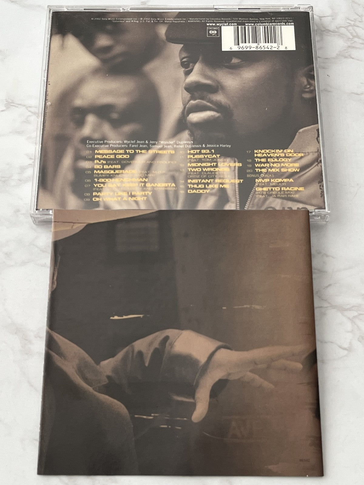 Wyclef Jean – Masquerade (2002)