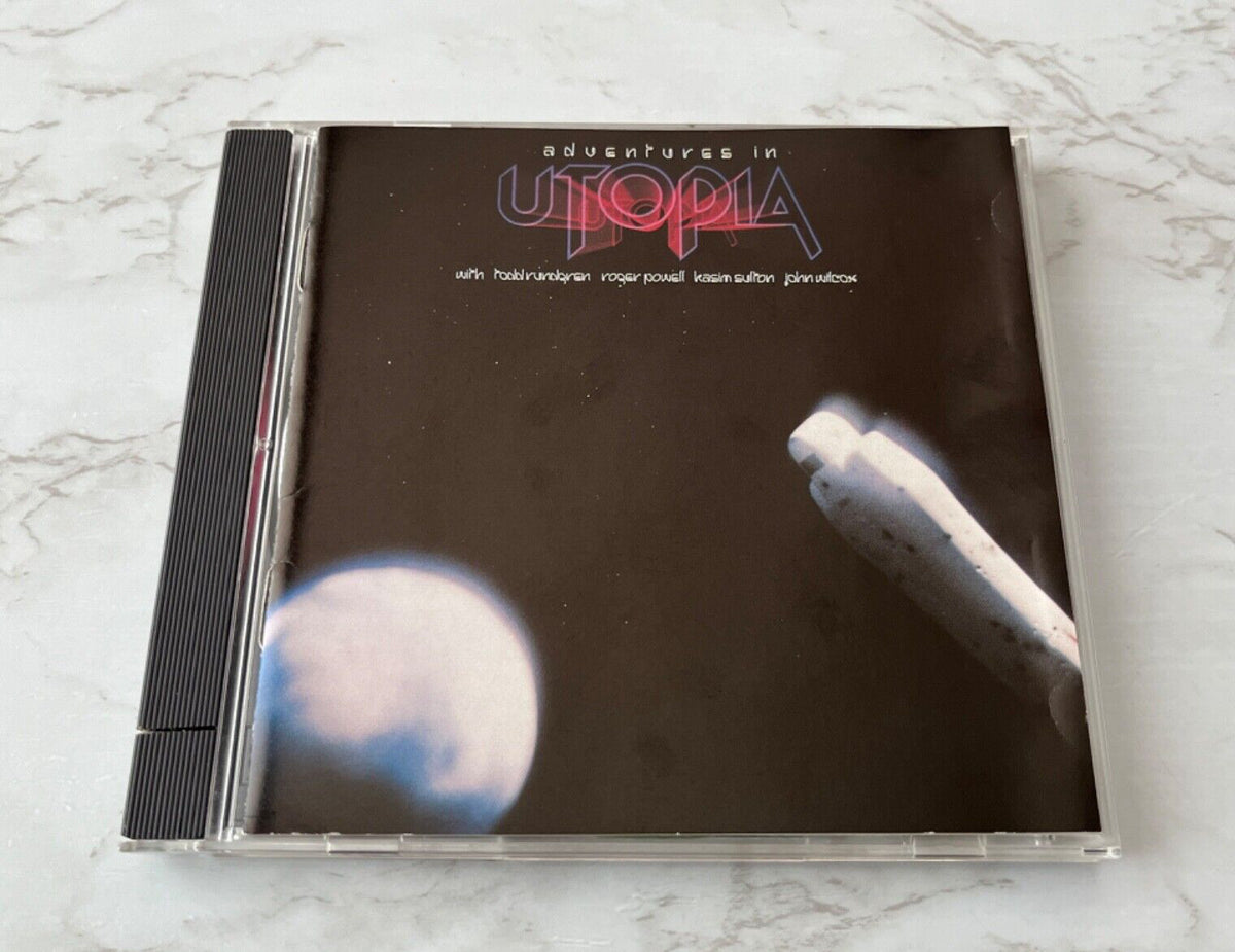 Utopia – Adventures In Utopia (Promo) (1987) [ORIGINAL USA PRESS]