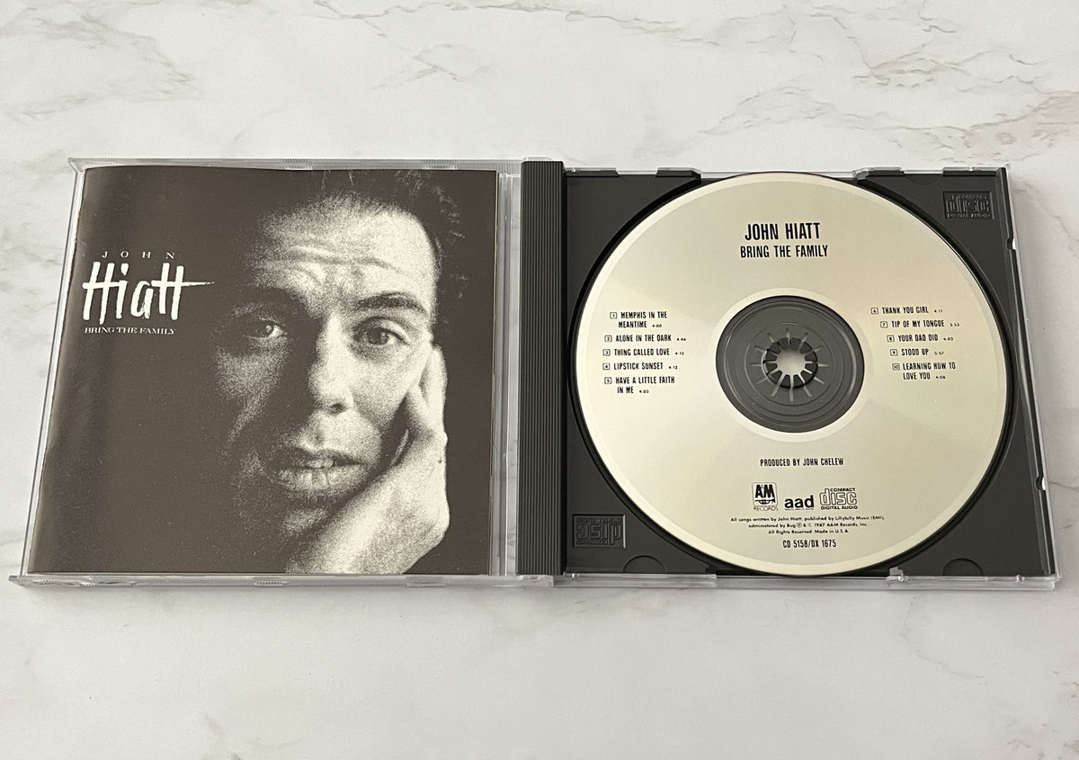 John Hiatt – Bring The Family (1987) [DADC PRESS]