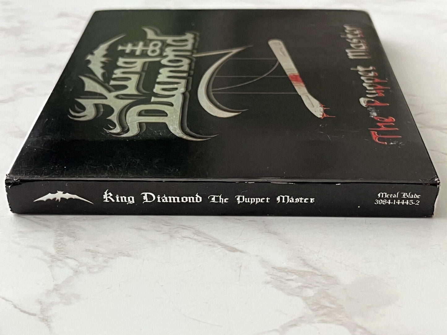 King Diamond – The Puppet Master (Digipak, CD/DVD) (2003)