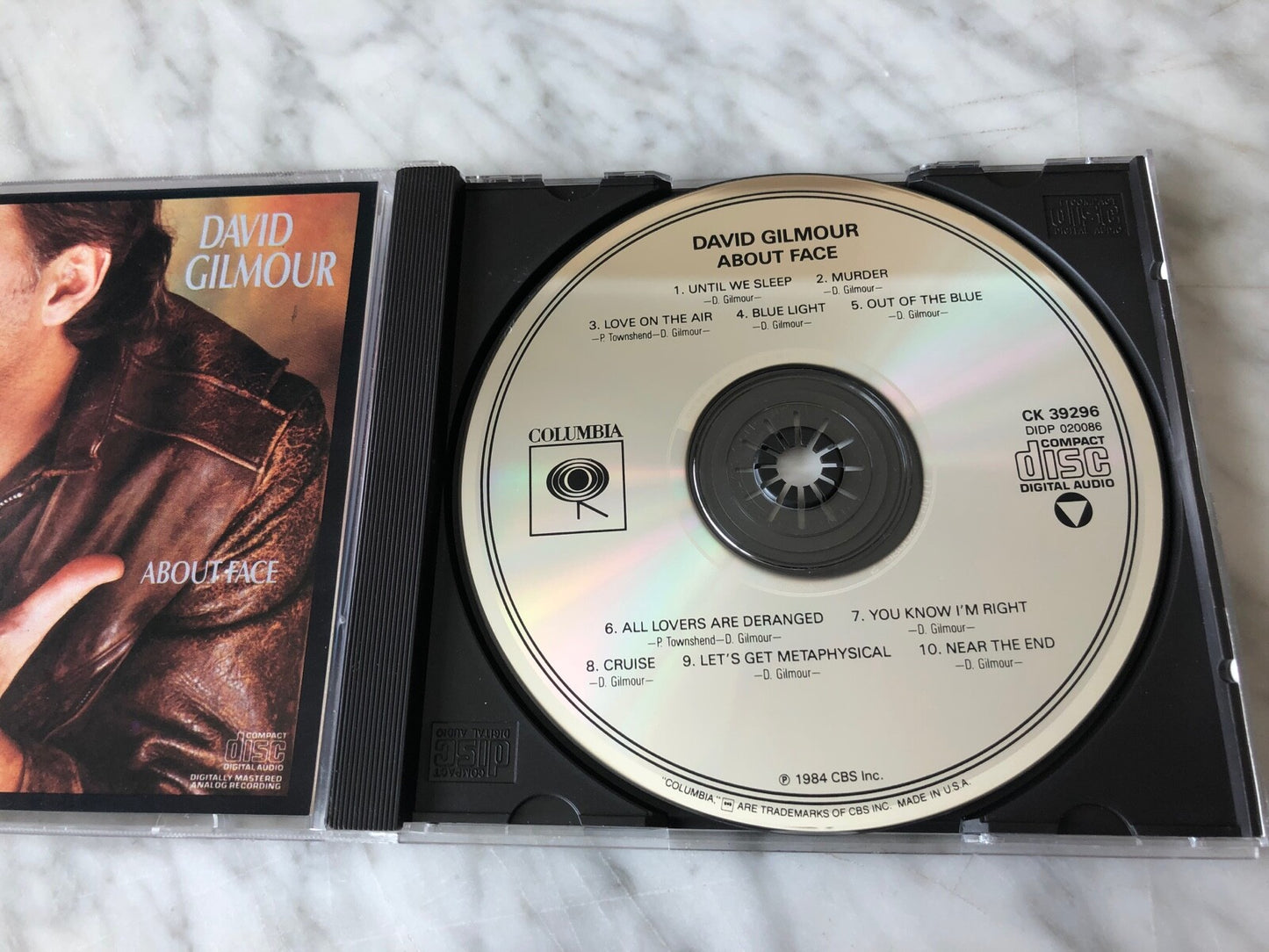 Pink Floyd, David Gilmour – About Face (1984) [DADC PRESS]