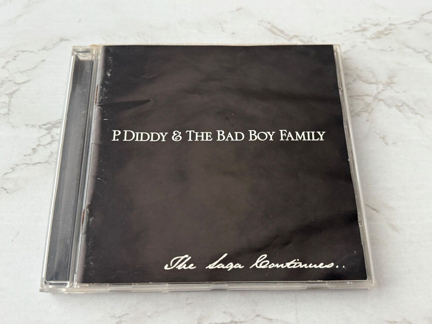 Puff Daddy – P. Diddy & The Bad Boy Family The Saga Continues (2001) [ORIGINAL USA PRESS]