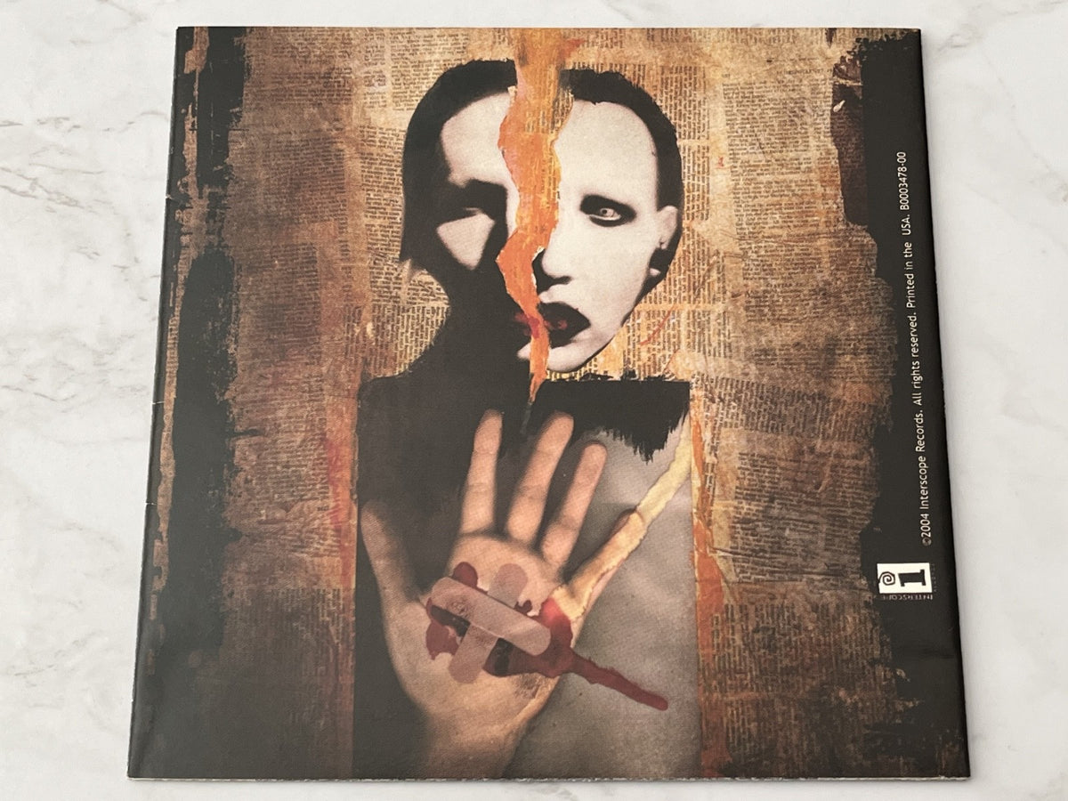 Marilyn Manson – Lest We Forget (Deluxe Edition, Digipak, CD/DVD) (2004)