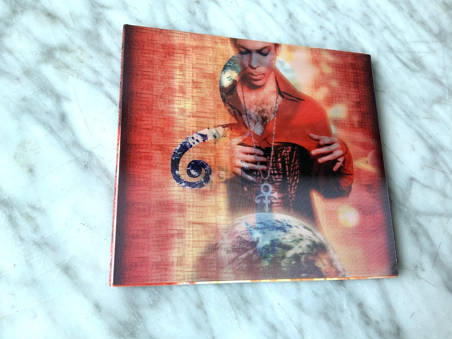 Prince – Planet Earth (Digipak) (2007) [ORIGINAL USA PRESS]